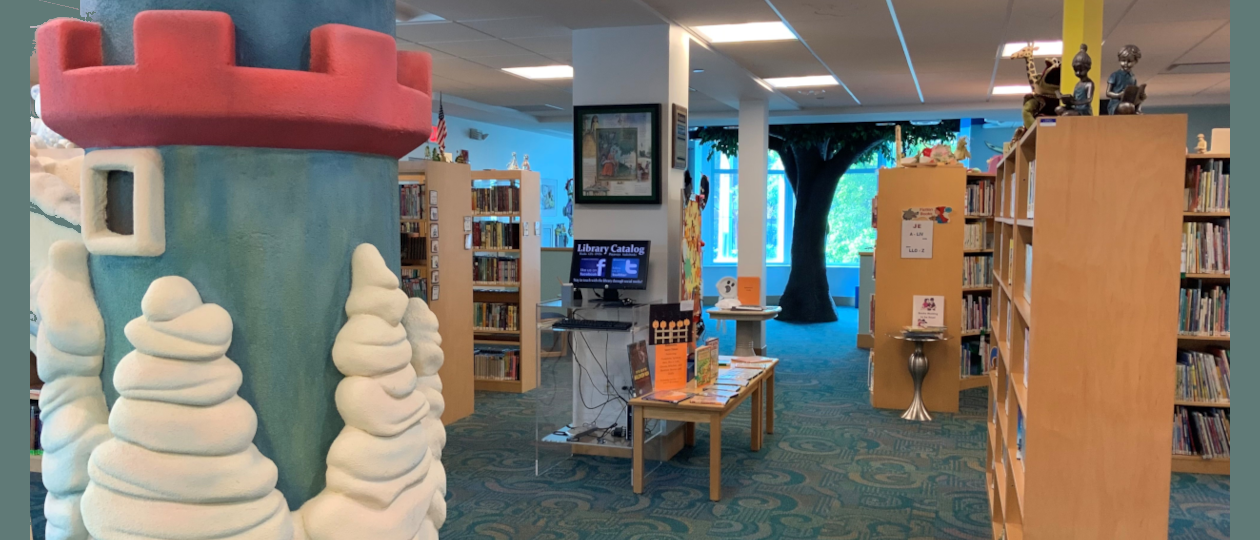 Interior building picture 1st floor Children's Area looking in at storytime tree area